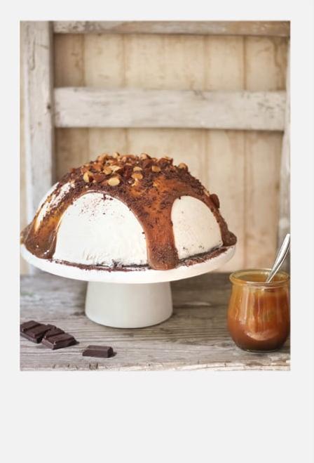  A delicious and creative way to enjoy coffee: Spiced Coffee Ice Cream Bombe with Caramel Syrup.