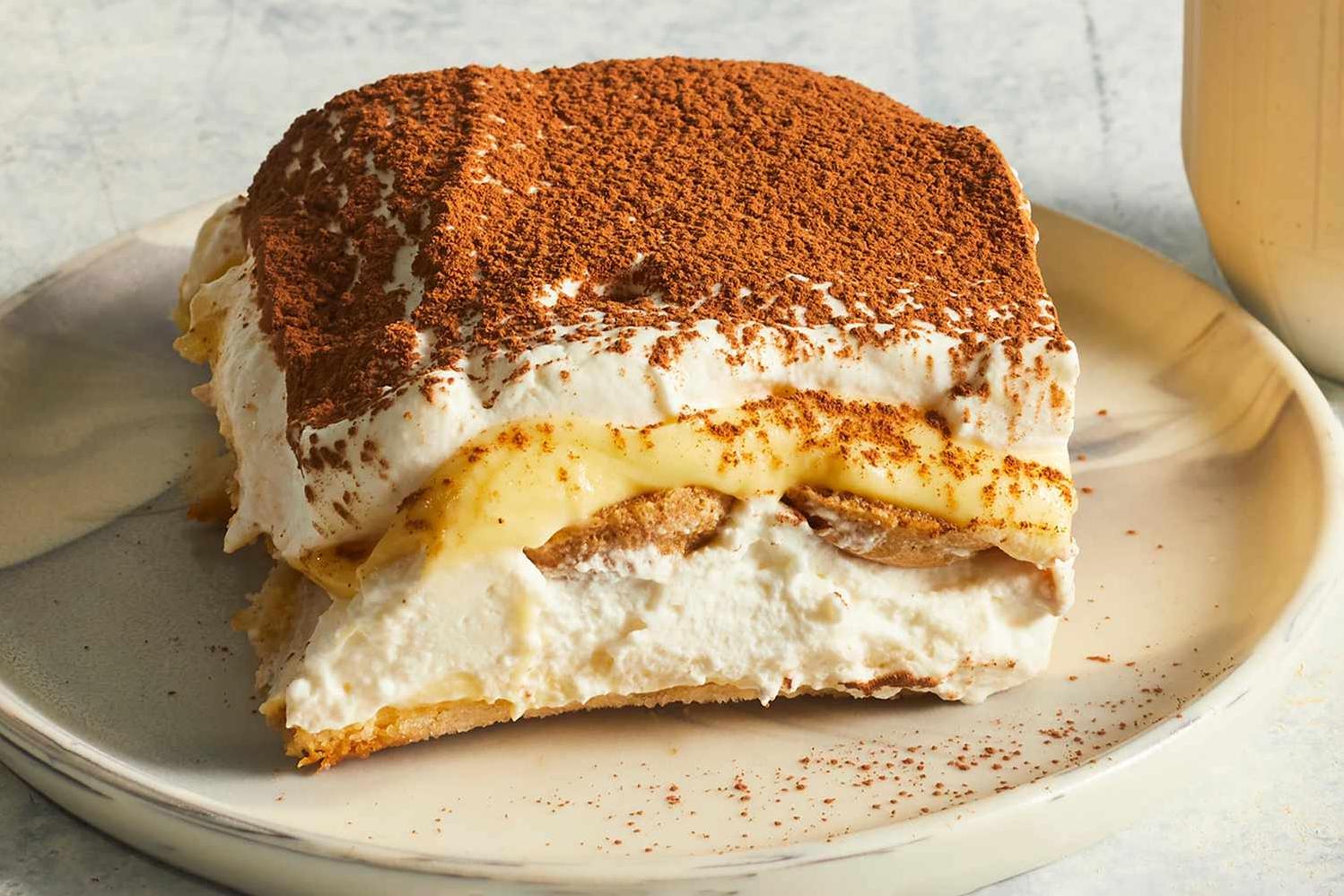  A perfect blend of coffee, mascarpone, ladyfingers, and cocoa, this Double Coffee Tiramisu will take your breath away!
