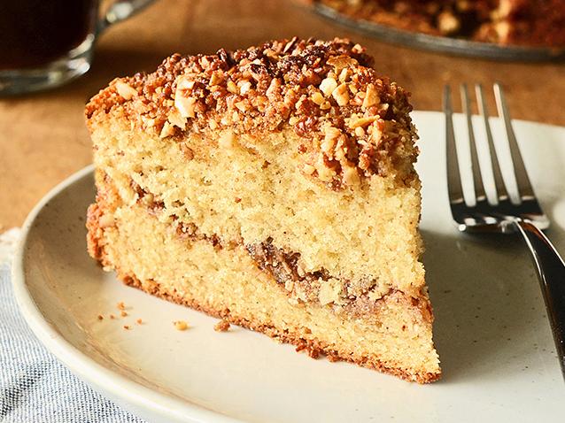  A warm slice of Pecan Sour Cream Coffee Cake, perfect for a cozy morning at home