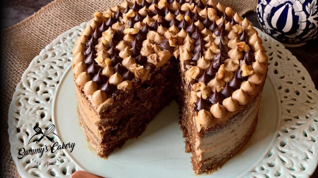  Bring the café experience to your home with this elegant and flavorful Coffee and Black Walnut Cake.