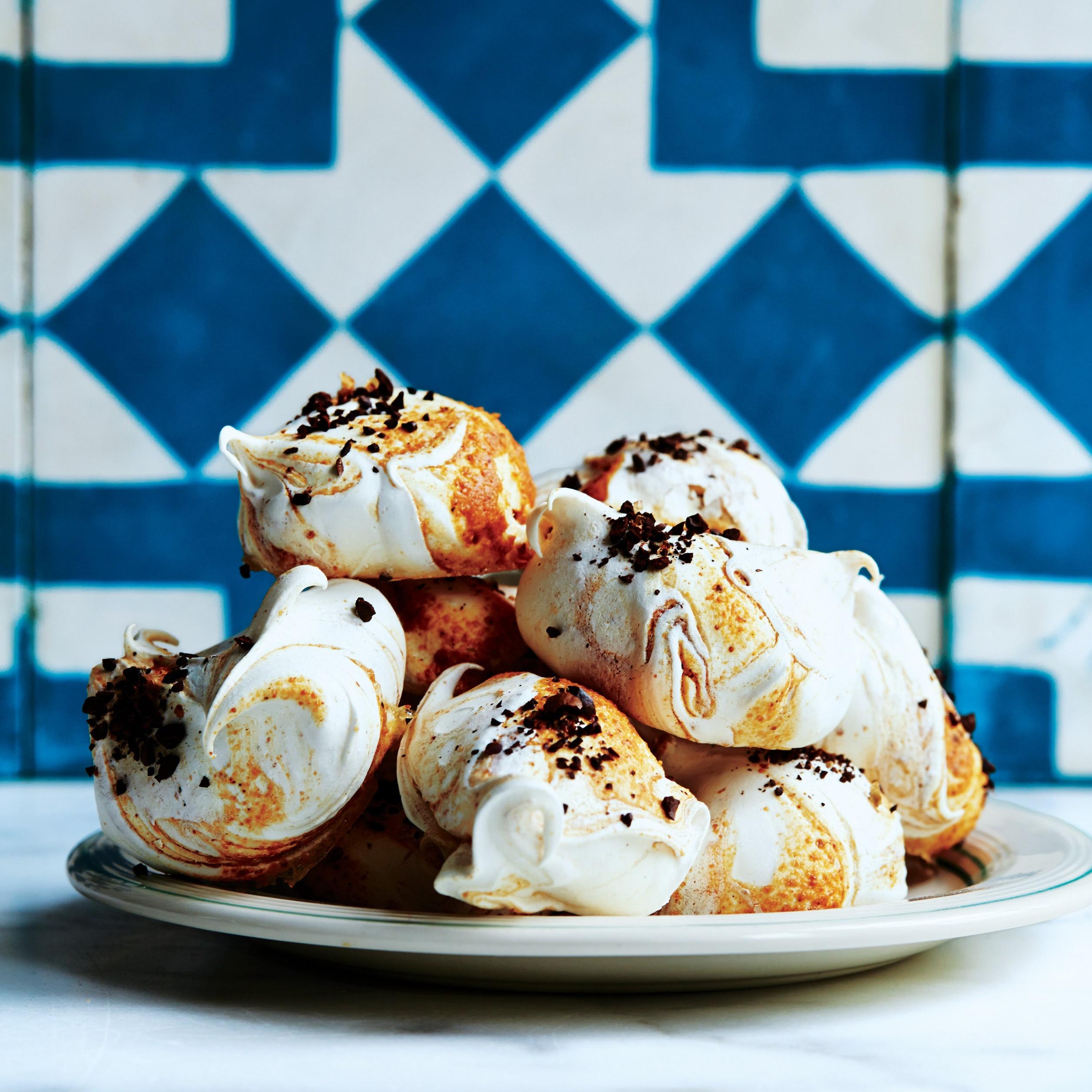  Elevate your dessert game with our Coffee Meringues with Mocha Cream!