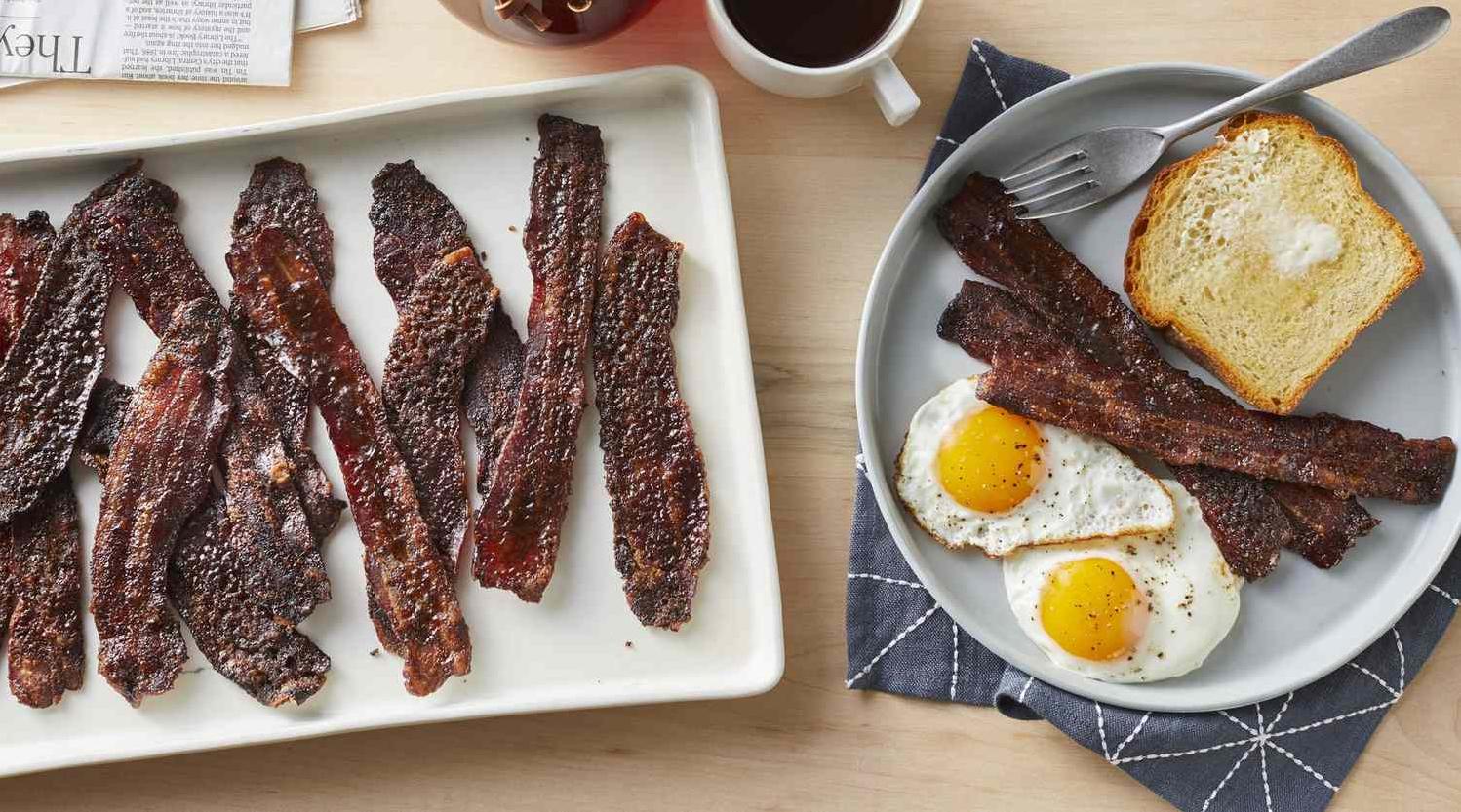  Give your breakfast a kick of caffeine with this sticky and delicious coffee-brown sugar bacon.