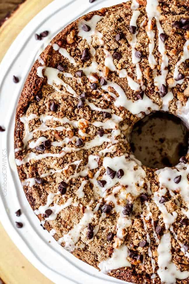  Indulge in the gooey, chocolate-loaded layers with every forkful of this Cream Cheese Stuffed Chocolate Chip Banana Bread Coffee Cake!