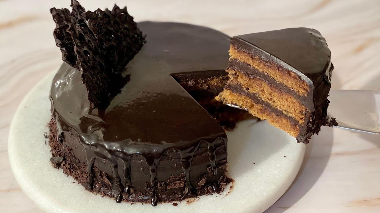  Indulge in the richness of this decadent chocolate and coffee truffle cake.