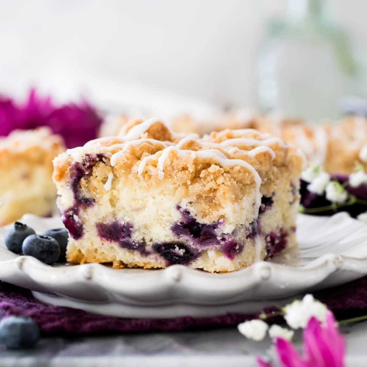 Let your taste buds dance with every bite of this blueberry coffee cake! 🎉