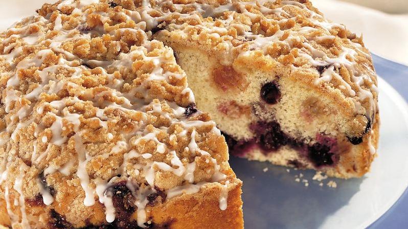  Let's get our coffee cake game on with this tangy Rhubarb Blueberry Sour Cream Coffee Cake!