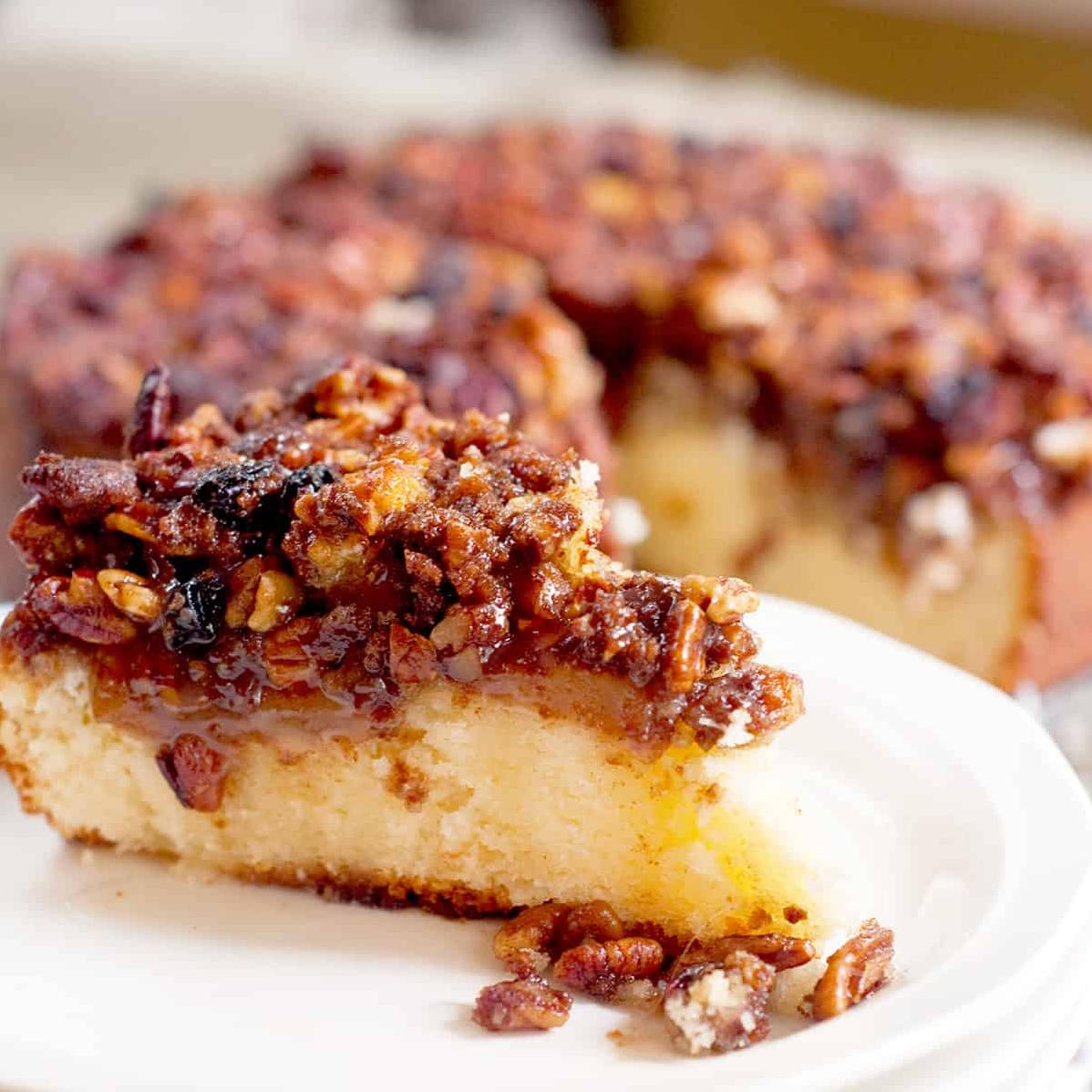  Make sure to sprinkle a generous amount of chopped pecans on top of the cake for added nutty flavor.