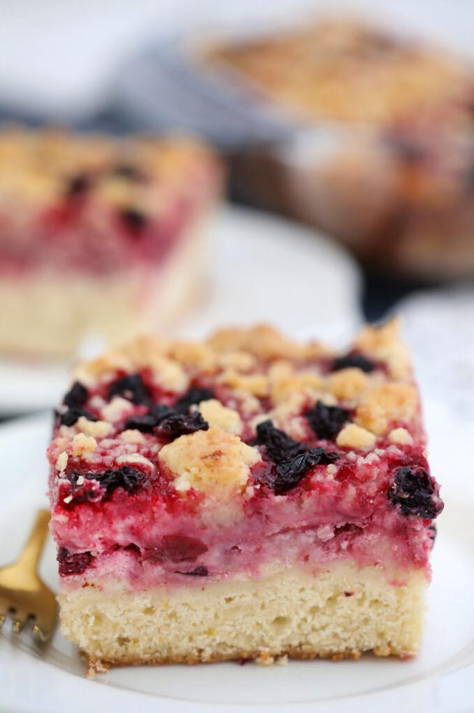  This coffee cake features the juicy and tangy flavors of cherries and blueberries.